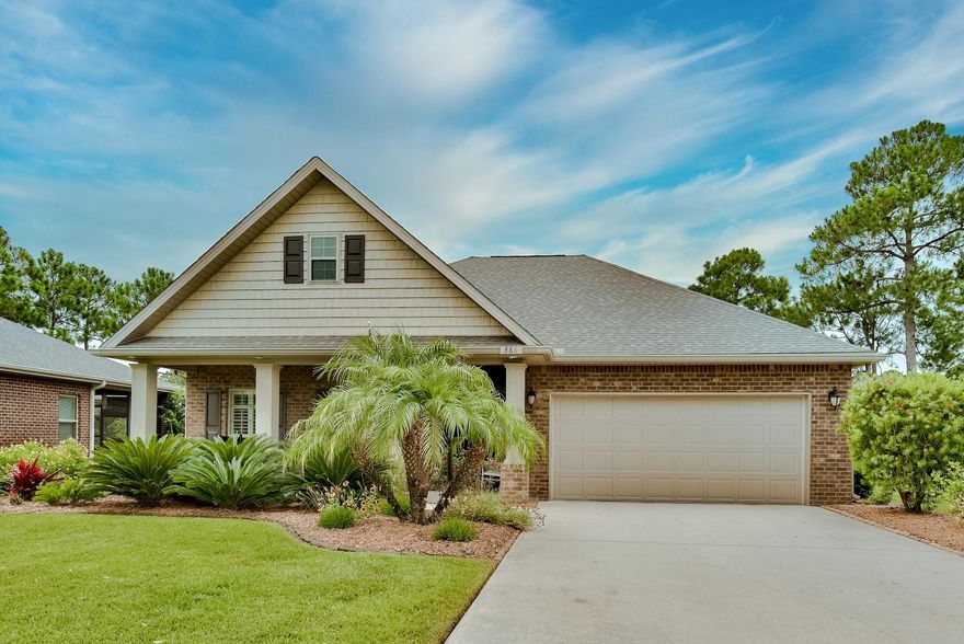 Lovely 3-bedroom, 2-bath home with great curb appeal & beautiful landscaping. This home is one level with 4-sided brick & hardboard exterior with a 2-car garage. The charming front porch gives a warm welcome with plenty of seating and gathering space. The beautiful and large foyer leads to a spacious open floor plan featuring vaulted ceilings, hardwood floors & a separate dining area just off the kitchen. The kitchen feels warm and rich with gorgeous granite countertops & deep wood cabinetry. Just beyond the living & dining area is a large back patio. This diverse outdoor space is great for entertaining with covered & uncovered options. The covered seating area features a multiple ceiling fan beneficial for summer months in Florida. The backyard is fully fenced & provides great privacy.