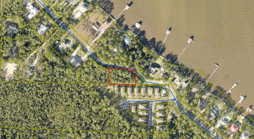 If you are searching for a lot to build your dream home, this is it!  This 1/2 acre wooded lot sits directly across the street from the Choctawhatchee Bay and is within a short distance to boat access, parks and the beaches of 30A! Buyer to verify all information.