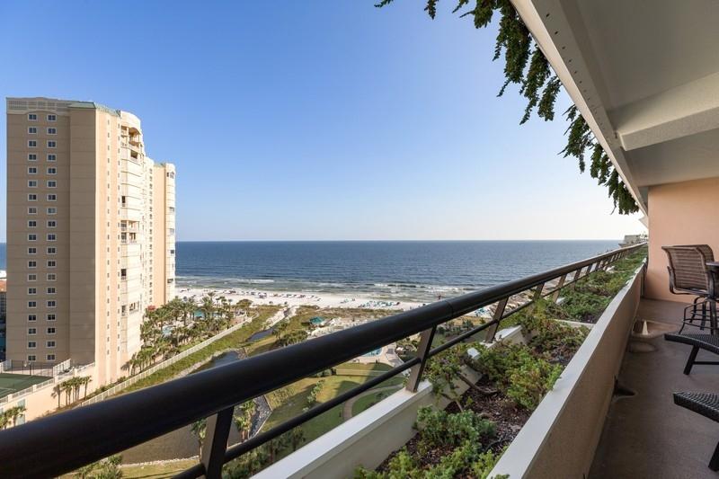 BACK-UP OFFERS being taken Stunning Gulf views from living area, kitchen and master bedroom of this spacious, COMPLETELY REMODELED unit. If you like cooking you'll love the larger size of this kitchen featuring stainless appliances, light granite countertops compliment the white shaker style cabinets. Beautiful low maintenance flooring throughout. The gated beach front community of Edgewater Beach offers two pools (one heated) a wading fall and waterfall spa. There is also fitness center, tennis, shuffleboard courts and more. Other amenities include a separate storage and covered parking. Don't wait, it's time for your new beach home away from home. Let yourself wake up to the emerald waters, white sand and endless blue skies. Wrap up your day with a refreshing cocktail on your private balcony.