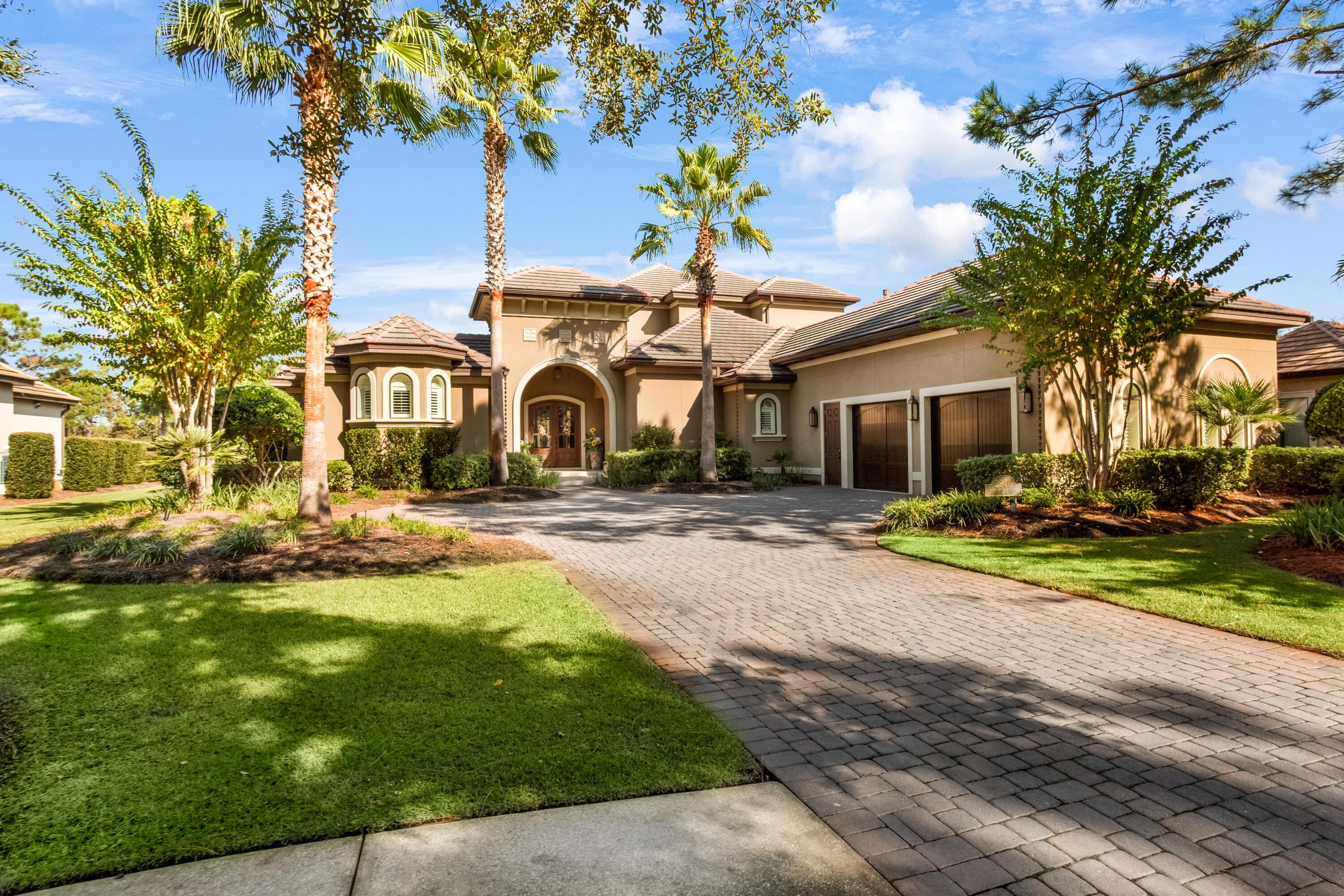 Situated on the 5th fairway of the Burnt Pine Golf Course, this meticulously kept Burnt Pine home greets you immediately with its great curb appeal and lush landscaping. Once you enter the foyer you are welcomed with serene views of the pool, water feature and golf course. This 4-bedroom, 4.5-bathroom contemporary home features a split floor plan and open living space. The gourmet kitchen features inspiring counter space and premium Wolf & KitchenAid appliances. A practical L-shape configuration, breakfast bar and separate island allow for tons of functionality and storage in this kitchen. Open to the kitchen are the dining room and family room which make for great entertaining. The living room features a gas fireplace, built ins and electric retractable blinds for privacy.
