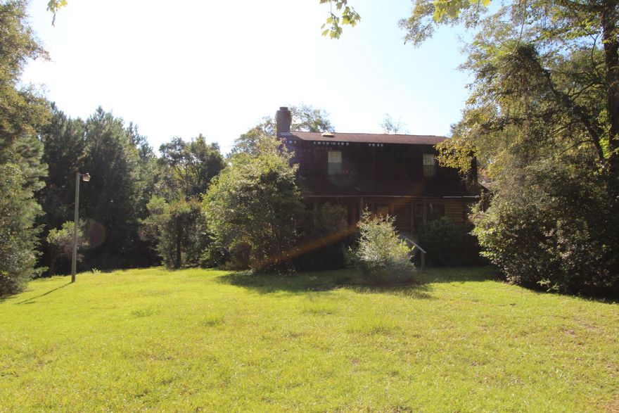 This home has a lot of potential.There is a 330 sq.ft. basement. It is a log cabin home.It offers a wood insert fire place that can heat the whole home. It comes with central a/c for the whole home. The garage has a apartment above it with 702 sq.ft. of living space. It has window a/c & wood heater.There is no Seller Disscloser Statement because the Power of attorney has know knowledge of the home,