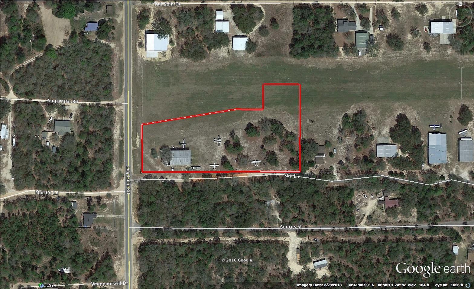 Grass Air Field! A slice of heaven just under the sunset on the Yellow River Airport! The corner lot with a 50x75 hanger in place. Theres is and old Mobile home with utilities, multiple tie down points. The county says its zoned rural residential and can be split into 3 lots ! This is an FAA private air field approximately 100 ft wide and 255 feet long. There is a 50 ft taxiway on each side of the run way. Bring you hanger /house plans and fly by for a visit! The location is just shut of I-10 near Destin Beaches, Military Bases, Crestview, Holt , Pensacola and Destin! Beautiful Oak trees, level home site and Beautiful Sun Sets!