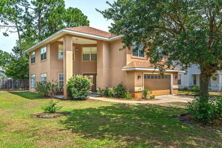 Welcome to this stunning 4-bedroom, 2.5-bathroom residence nestled on a spacious corner lot. This charming home offers a perfect blend of modern features and timeless appeal located in Driftwood Estates. Step into the well-appointed kitchen, adorned with stainless steel appliances that effortlessly combine style and functionality. The master bathroom boasts a luxurious double vanity, along with a stand-up shower and a soothing soaker tub, creating an oasis of relaxation. As you enter the dining room, you'll be captivated by the soaring high ceilings, creating an airy and elegant ambiance for entertaining guests. The main living areas showcase beautiful flooring, adding warmth and sophistication.