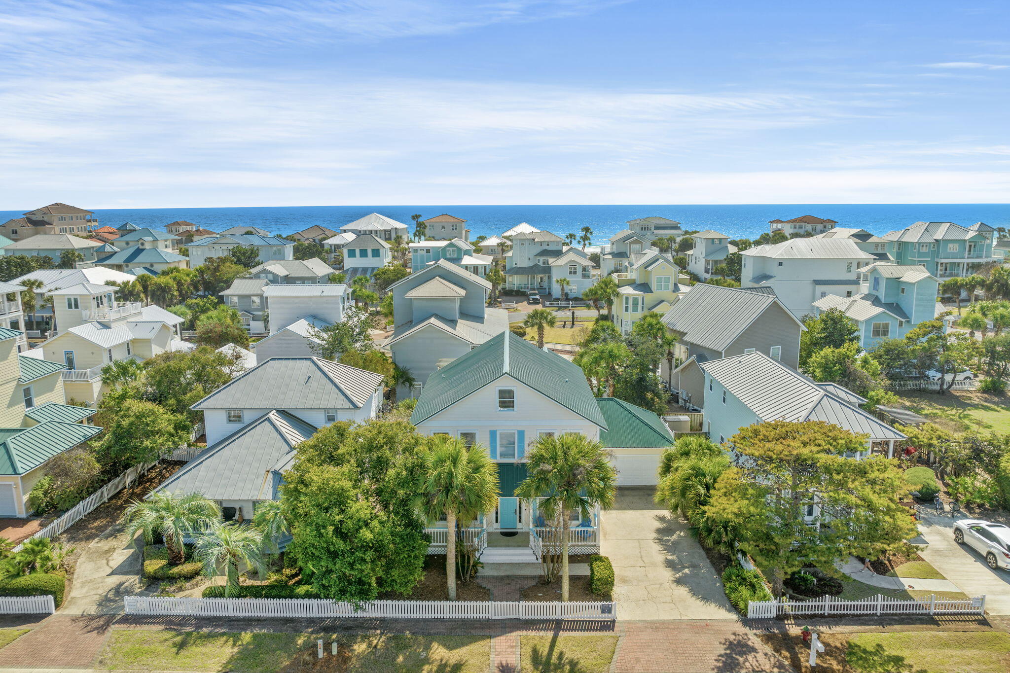 Priced to sell, this turn key rental machine w/ private pool AND community pool 150 feet away has it all. 2024 gross: $170K - with owner usage. PM Projections are up to $249K. Convert garage into a game room for increased revenue $$. One block from the white sandy beach, this quintessential beach house is newly remodeled & spacious. This beautiful home is the ideal family beach house or investment property. Set behind a white picket fence in the heart of Crystal Beach, the brick paver sidewalk leads right to the front porch, two-car garage and generous driveway for parking. Open floor plan and many improvements made in the last 2 years