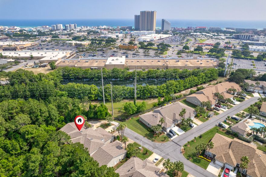Pool, 3 bedrooms, 2.5 bathrooms, with a downstairs primary bedroom, 2 car garage townhome in Miramar Beach's private community of the Bon Villas. This community offers a pool and is located in a beautiful coastal destination known for its pristine white sand beaches, perfect for relaxing and soaking up the sun. The beach access from 126 S Shore Dr unit 18. is just a short walk away, allowing you to enjoy the crystal-clear waters and stunning views whenever you please. In addition to the beach, Miramar Beach offers a variety of shopping options, from quaint boutiques to large shopping centers, where you can find everything you need. When it comes to dining, the area boasts a wide range of restaurants serving up delicious seafood, international cuisine, and more. This is a spacious three-bedroom, 2.5 bath home. As you enter the home, you'll be greeted with high ceilings and a gas fireplace with lighted shelving. The living room flows seamlessly into the dining area, which is outfitted with a chair railing and French doors leading to the screened porch. The adjacent kitchen boasts modern appliances, granite countertops, a breakfast bar with pendant lighting and a breakfast nook.

The primary bedroom suite on the first floor includes a large walk-in-closet, a en-suite bathroom with a double vanity, shower and tub. Two additional large bedrooms on the second floor provide plenty of space for gathering and guests. The home also features a convenient half bathroom on the first floor, an inside laundry room and hard flooring throughout. Outside, you'll love the privacy of the screened porch and the community pool, down the street. 

Miramar Beach is conveniently located between Destin and 30A, making it easy to explore the surrounding areas. Destin is known for its vibrant harbor, fishing charters, and group attractions, while 30A is famous for its scenic coastal communities, art galleries, and outdoor activities. Whether you're looking to relax on the beach, shop 'til you drop, or indulge in delicious food, Miramar Beach has something for everyone. 
