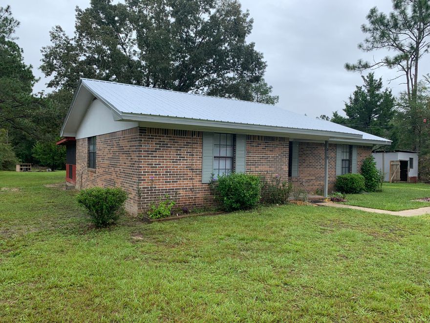 Cute little cottage home!  3 bedroom, 1 1/2 bath. new stainless steel appliances, new flooring, new paint and new roof!  House is on well water and septic so no water/sewer bill.  Large enclosed back porch with a huge back yard!  Wonderful location for quiet peaceful living!