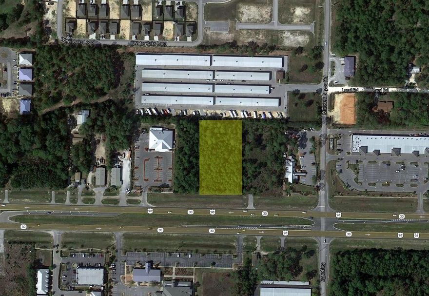 HUGE PRICE REDUCTION!! OWNER SAYS BRING OFFERS. THIS 1.30 ACRE PROPERTY IS IN A GREAT LOCATION BETWEEN BAYOU BILL'S RESTAURANT AND LOUIS-LOUIS RESTAURANT. 200 FRONT FEET ON THE NORTH SIDE OF HIGHWAY 98 ZONED VMU (VILLAGE MIXED USE). LOT'S DIMENSIONS ARE 200 X 283. SURVEY AVAILABLE UPON REQUEST.