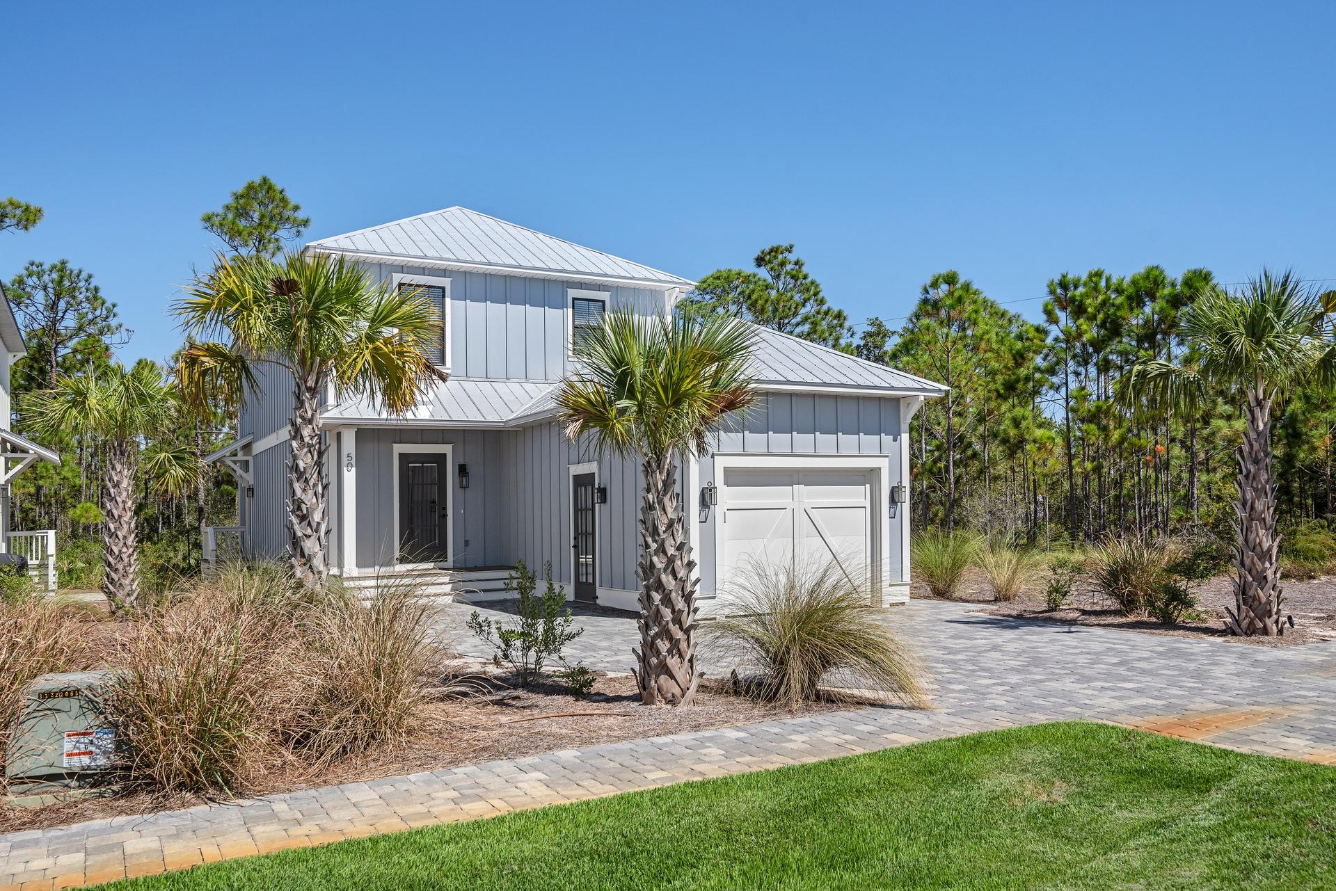 Beautiful, like new home on 30a's desirable west end. Located in the new community of Heron Crossing, this 4 bedroom, 3.5 bath home boasts quality construction with hardwood floors throughout (no carpet), granite counters, stainless appliances, and crown moulding. In addition to the 4 bedrooms, there is also a bonus room perfect for a bunk room, art studio, or office/den. The first floor includes a spacious living/dining area that is open to the gorgeous kitchen with large island and pantry. The master suite is also located on the main level as well as a powder room. Upstairs there are 3 more bedrooms, 2 full baths, and bonus room. The current owner has recently installed a mini-split A/C system in the garage making it a perfect space for a workshop or that special antique car. Heron Crossing is a small peaceful community featuring a beautiful community pool and is adjacent to Topsail Hill Preserve State Park. The beach at Topsail is one of the most beautiful and peaceful spots on 30a and is within walking/biking distance. Just a short drive away is Grande Boulevard which features upscale shopping, restaurants, movie theater, Publix, and much more!