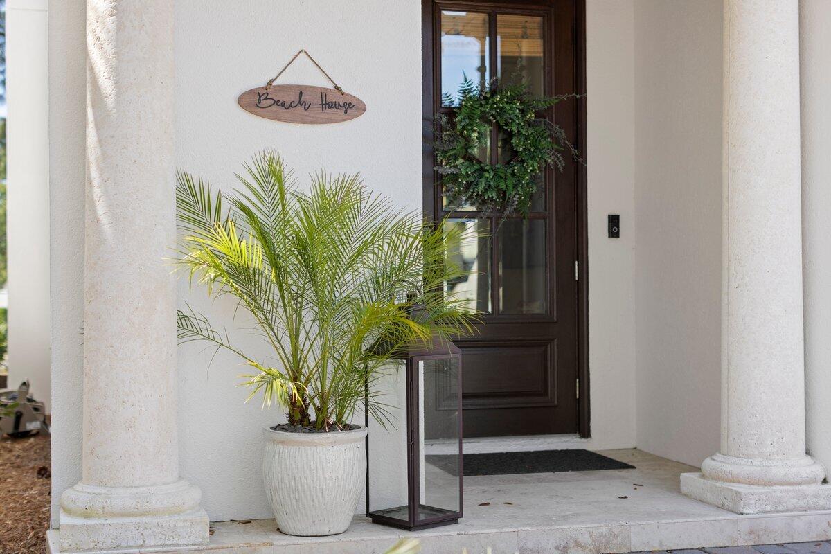 This exquisite property is ideally situated on the 5th hole of the Baytowne Golf Course within The Sandestin Golf and Beach Resort. Revel in the breathtaking views of the lush fairways and enjoy seasonal fireworks from the comfort of your private screened patio or 2nd story balcony. Inside, the residence has been beautifully updated into a contemporary beach oasis, featuring stunning white quartz countertops, open shelving, and stainless steel appliances in the elevated kitchen. The living area is both warm and inviting, adorned with custom features to enhance your comfort. Upstairs, the primary suite awaits, along with two additional spacious bedrooms and bonus office space. A one-car garage adds convenience and a 6 seater golf cart is included in the sale. Easy walk to community pool!