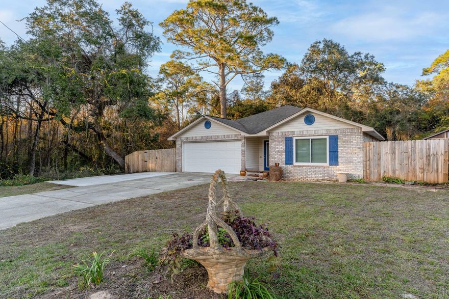 MOTIVATED SELLER!! NO HOA!! **UPDATED Interior/Exterior** Granite Countertops throughout, all NEW Impact Windows in 2023, NEW Garage Door, stylish Wainscoting in main common areas, and fresh NEW Paint!! FLOOD ZONE X! This is a must have 3 bedroom 2 full bath home with absolutely NO CARPET throughout! 2021 Hot Tub (AS-IS) out back.. slightly has been used and ready for these chilly winterish nights ahead. ALL inside furnishings are negotiable and can stay with the home outside of the contract.  HVAC has been serviced recently and Roof will be replaced prior to closing with an acceptable offer. Schedule your showing TODAY!! PRICED 2 SELL!