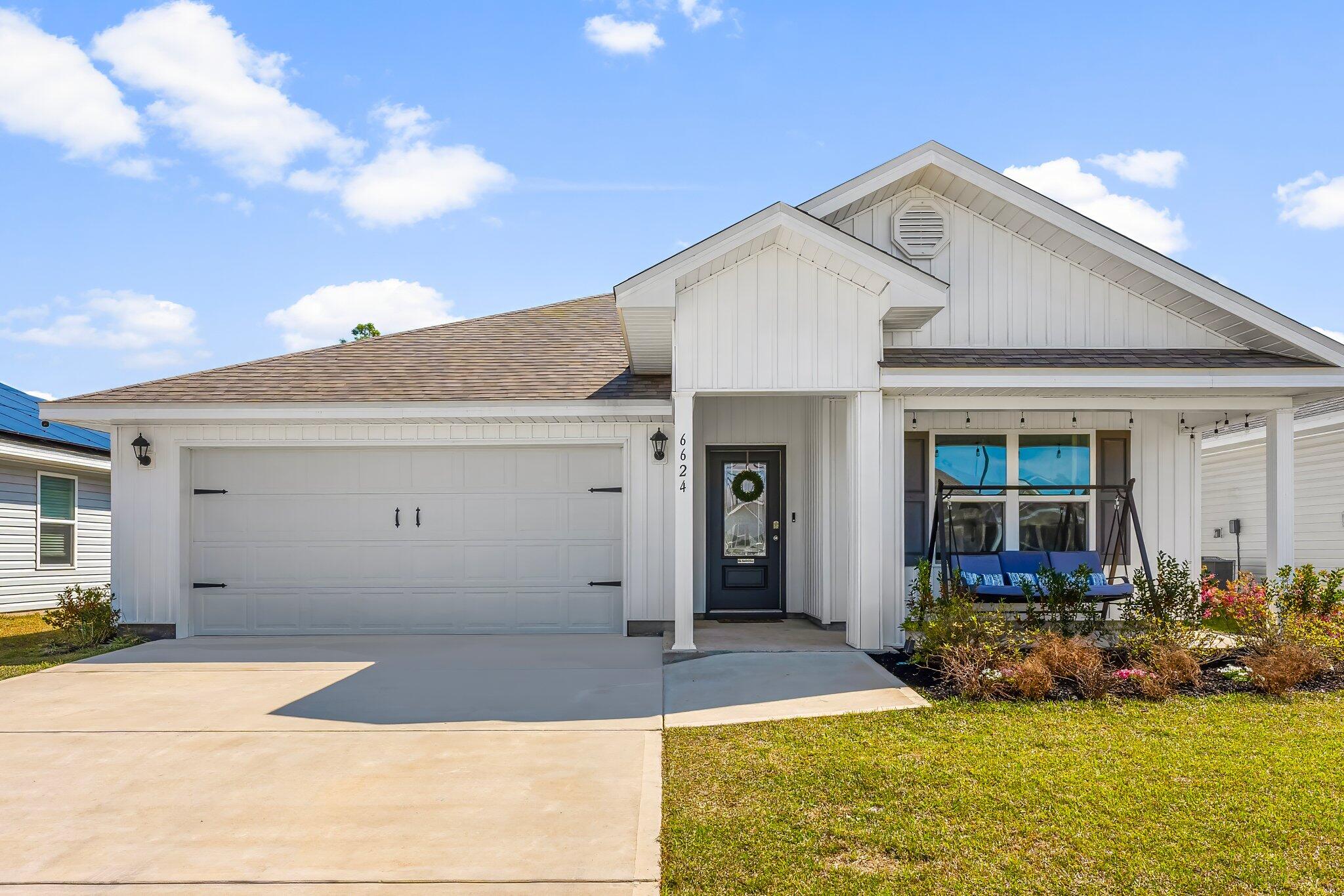 CURRENTLY UNDER CONTRACT, SELLER WILL CONSIDER BACKUP OFFERS Welcome to your dream home at 6624 Slabinski Lane, nestled in the sought-after Liberty Neighborhood of Panama City, Florida! This beautifully maintained residence boasts a host of recent upgrades, including a modernized kitchen sink and fresh paint throughout, ensuring a move-in-ready experience. The oversized expanded back patio provides ample space for outdoor entertaining, and with the property backing up to an easement, you'll enjoy added privacy and tranquility. As an added bonus, the sellers are offering the opportunity for a buyer to assume their VA assumable loan. This newly constructed 4-bedroom home features smart home technology, 1,867 square feet of living space, and a 2-car garage.