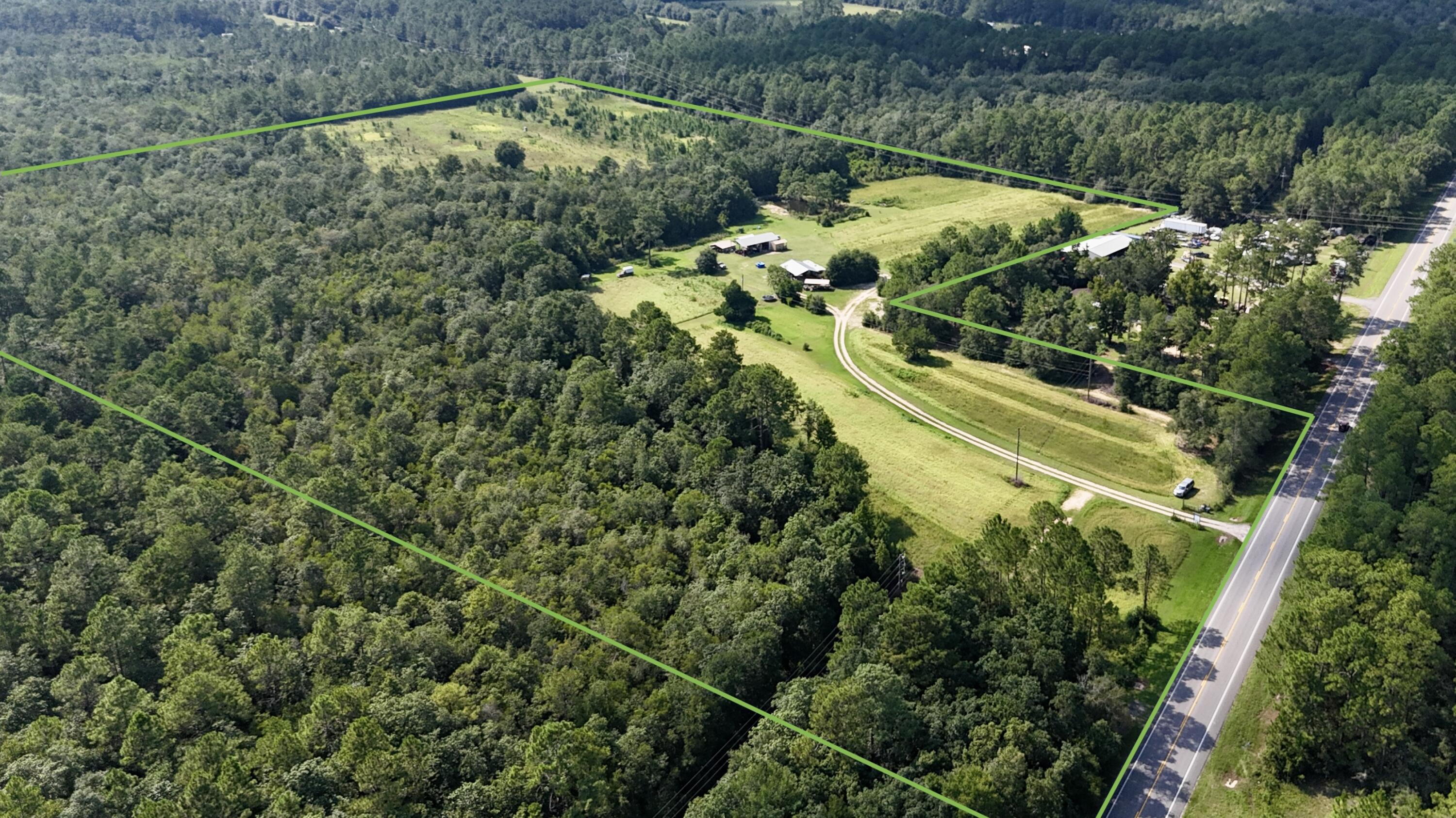 Located just north of DeFuniak Springs, this 48-acre property offers a great mix of open space and wooded privacy. With approx. 18 acres of open ground and the rest in mature woods, it's ideal for a homesite, farm, or recreational use. A small pond adds charm and function, and the property has direct gated access to Hwy 331.Don't miss this versatile tract with room to grow, hunt, or build--just minutes from town.