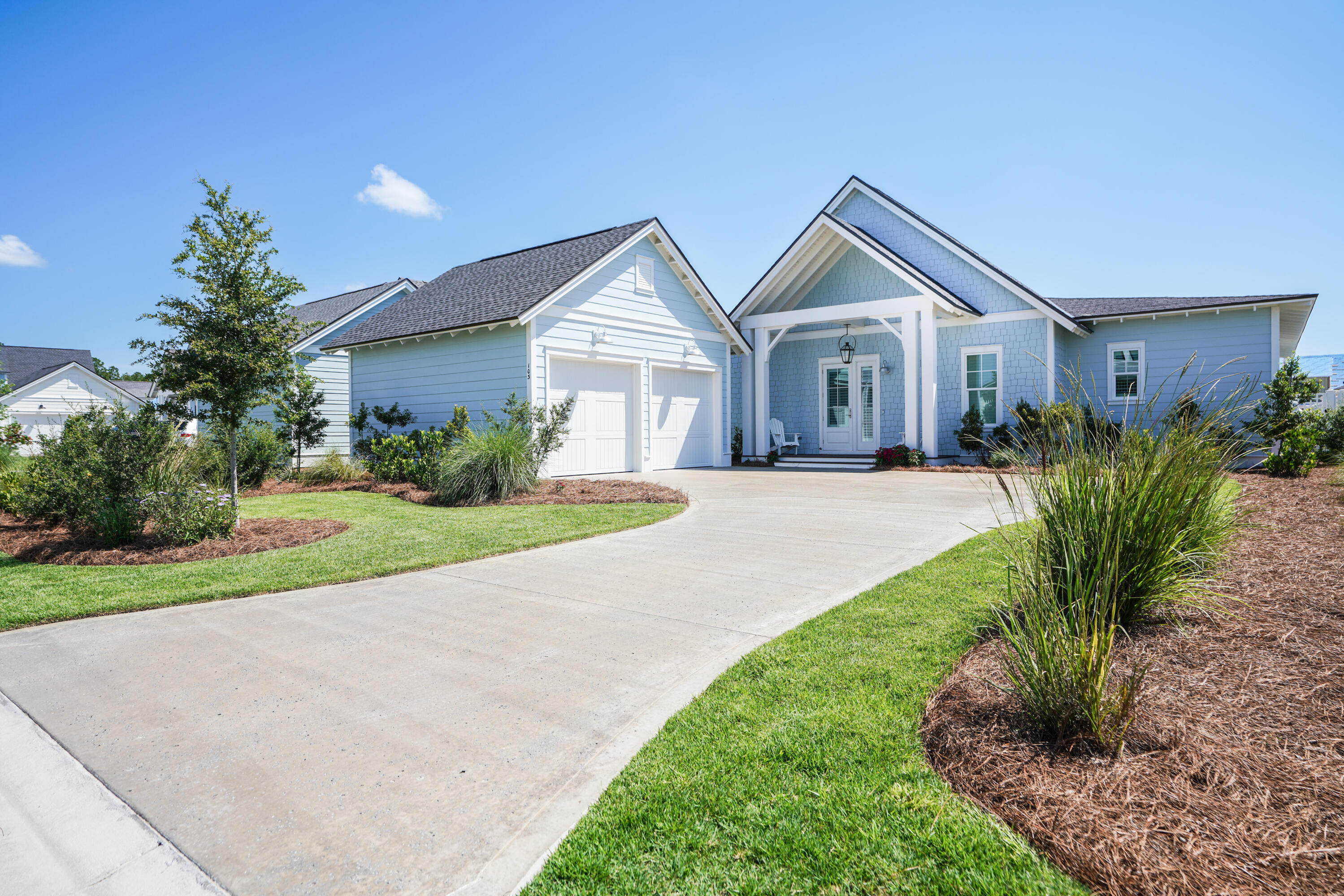 Welcome to 103 Sawbuck Drive located in the heart of Watersound Origins. Located on a quiet street this sought after Duxbury one story floor plan is just a short walk to all the fabulous amenities that includes a community pool, playground, Open Green Spaces, Golf Course, Tennis Courts, Gym, Lake Powell and more. Located all on one level, the open floor plan features a spacious family room. Beautiful wide-plank hardwood flooring throughout the living areas and 3.5'' wood shutters are just a few of the many upgrades in this breathtaking home. The natural light makes the Family room or the covered patio the perfect place for morning coffee or great spot for relaxing at the end of the day. The main Suite with Hardwood Floors is very spacious with two walk-in closets and the main bath