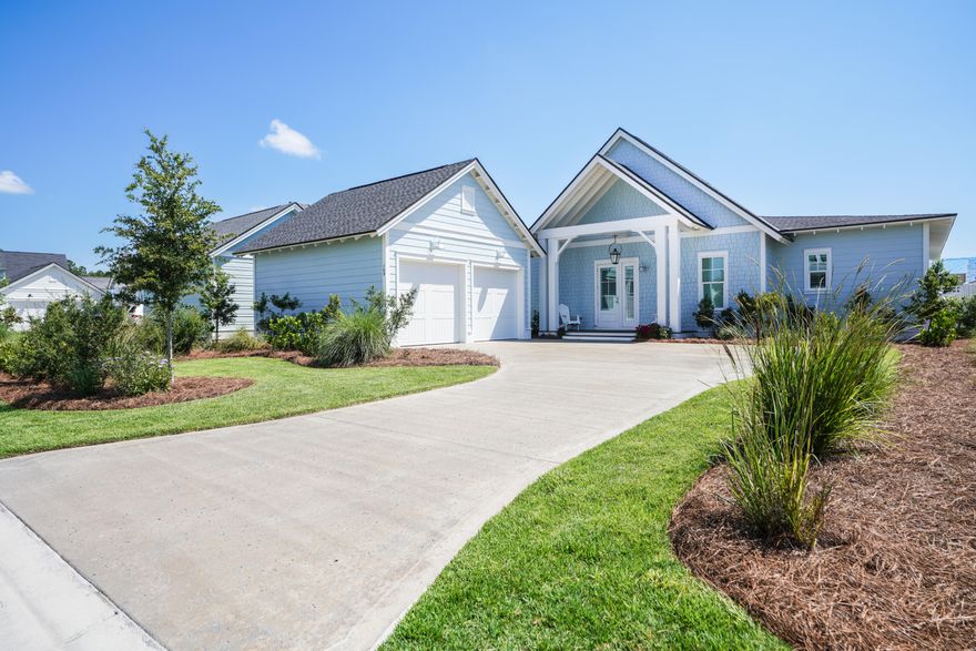 Welcome to 103 Sawbuck Drive located in the heart of Watersound Origins. Located on a quiet street this sought after Duxbury one story floor plan is just a short walk to all the fabulous amenities that includes a community pool, playground, Open Green Spaces, Golf Course, Tennis Courts, Gym, Lake Powell and more. Located all on one level, the open floor plan features a spacious family room. Beautiful wide-plank hardwood flooring throughout the living areas and 3.5'' wood shutters are just a few of the many upgrades in this breathtaking home. The natural light makes the Family room or the covered patio the perfect place for morning coffee or great spot for relaxing at the end of the day. The main Suite with Hardwood Floors is very spacious with two walk-in closets and the main bath