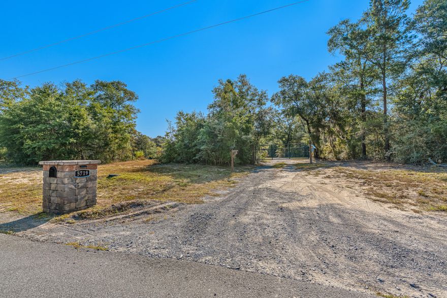 Experience the best of country living on 4.67 acres of thoughtfully prepared land. Blending open, elevated spaces with beautiful wooded areas, this property offers the perfect setting for a custom home, private retreat, or investment opportunity.Essential improvements are already in place, including power, city water, and a septic system designed to accommodate two RVs. A gravel driveway provides a welcoming entry, while a metal storage building offers secure and convenient space for equipment.A spring-fed creek flows through the property and, once restored, will naturally replenish a large pond--creating a stunning focal point and enhancing the land's natural charm. The wooded portions of the property add privacy and character, while the open areas provide ample room for building or recreation. Wildlife, including deer, are frequently seen, underscoring the serene environment.

With its balance of cleared and wooded land, established utilities, and scenic water features, this property is a rare opportunity to build your vision in a tranquil setting.