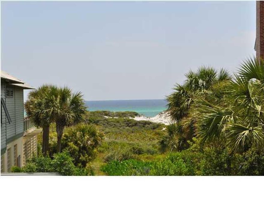 Located on the SOUTH side and right above the fitness center and right next to the WaterColor Beach Club. It has views over looking Western Lake and the Gulf of Mexico. The living room and master bedroom have high ceilings, floor-to-ceiling windows and French doors that open onto a deck overlooking the Gulf. Recently renovated, new photos coming soon!