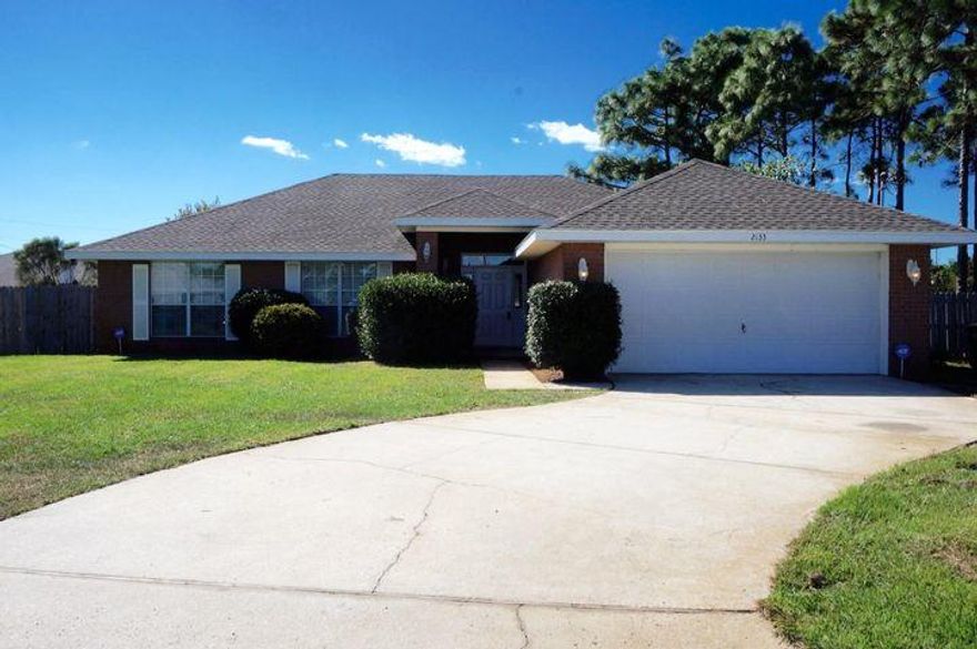 Welcome home to this perfectly located east Navarre retreat! Have peace of mind with a roof and water heater installed in 2015 and a new HVAC system less 6 months old, ,and a brand new lawn pump installed this year! Conveniently located at the end of a quiet cul-de-sac just minutes from Navarre's gorgeous beaches, a short commute to Hurlburt Field, and an even shorter walk or bike ride to Navarre High School, the YMCA, and the NYSA where you'll find wonderful community amenities. This all brick beauty features four bedrooms and two bathrooms in a split floor plan on a large lot! Enter the front door and you'll find closet storage at the entryway as it opens to the spacious living room.