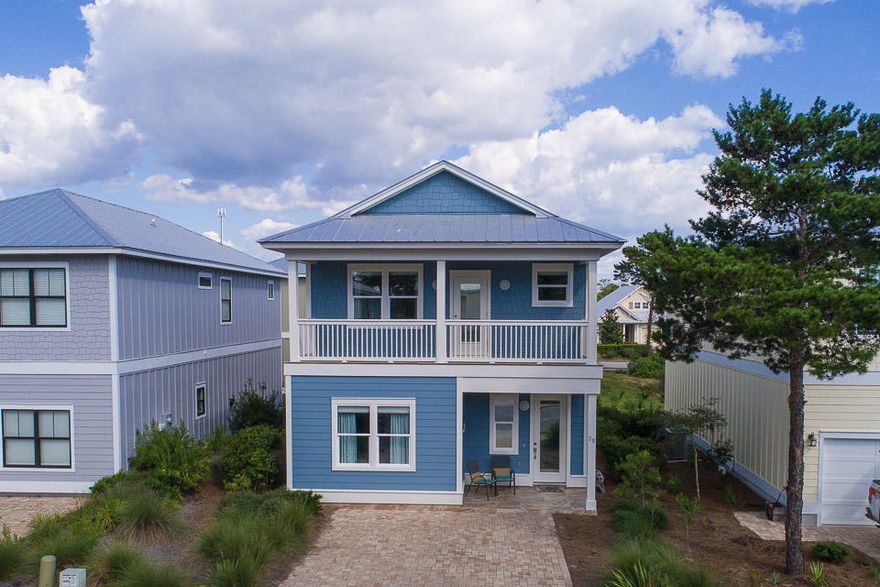 A TERRIFIC LOCATION. This 4 BR &4.5 BA home is one of the best values available on 30-a. The location is superb: so close to Gulf Place, Shunk Gully, and Ed Walline County Gulf front park. This home has never been a rental and is pristine both inside and out. The exterior has just been painted and the furnishings are very up scaled, beautiful and comfortable. The house has a large open living area that promotes a family friendly lifestyle. There are three bedrooms up stairs with one bedroom down. There are basically two masters. The one upstairs opens to a full porch. The back of the home has a nice patio for cooking out and back yard living. There is a community pool just two homes away offering all the pool fun families love. This community is Golf cart friendly and .5 miles to the Gulf