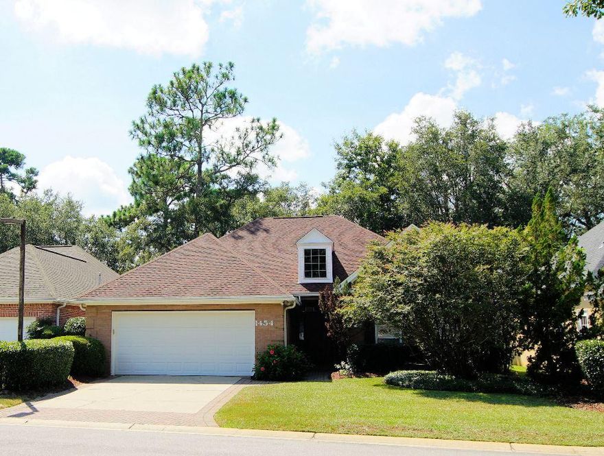 BACK ON THE MARKET - buyers orders were unexpectedly cancelled...Life in Oakmont Place...the perfect Bluewater Bay golf course neighborhood designed for the easy, carefree Florida lifestyle! This home overlooking the golf course fairway is MOVE IN ready with new carpet, fresh paint and a whole house generator. The open floorplan with easy maintenance porcelain tile floors (in all but two bedrooms) is very flexible with the master on one side and two additional bedrooms on the other. One of the bedrooms can easily be utilized as an office because it has double french doors opening to the great room. You can enjoy the expansive golf course views from the open patio yet still enjoy your privacy from the all weather room just off the breakfast nook.