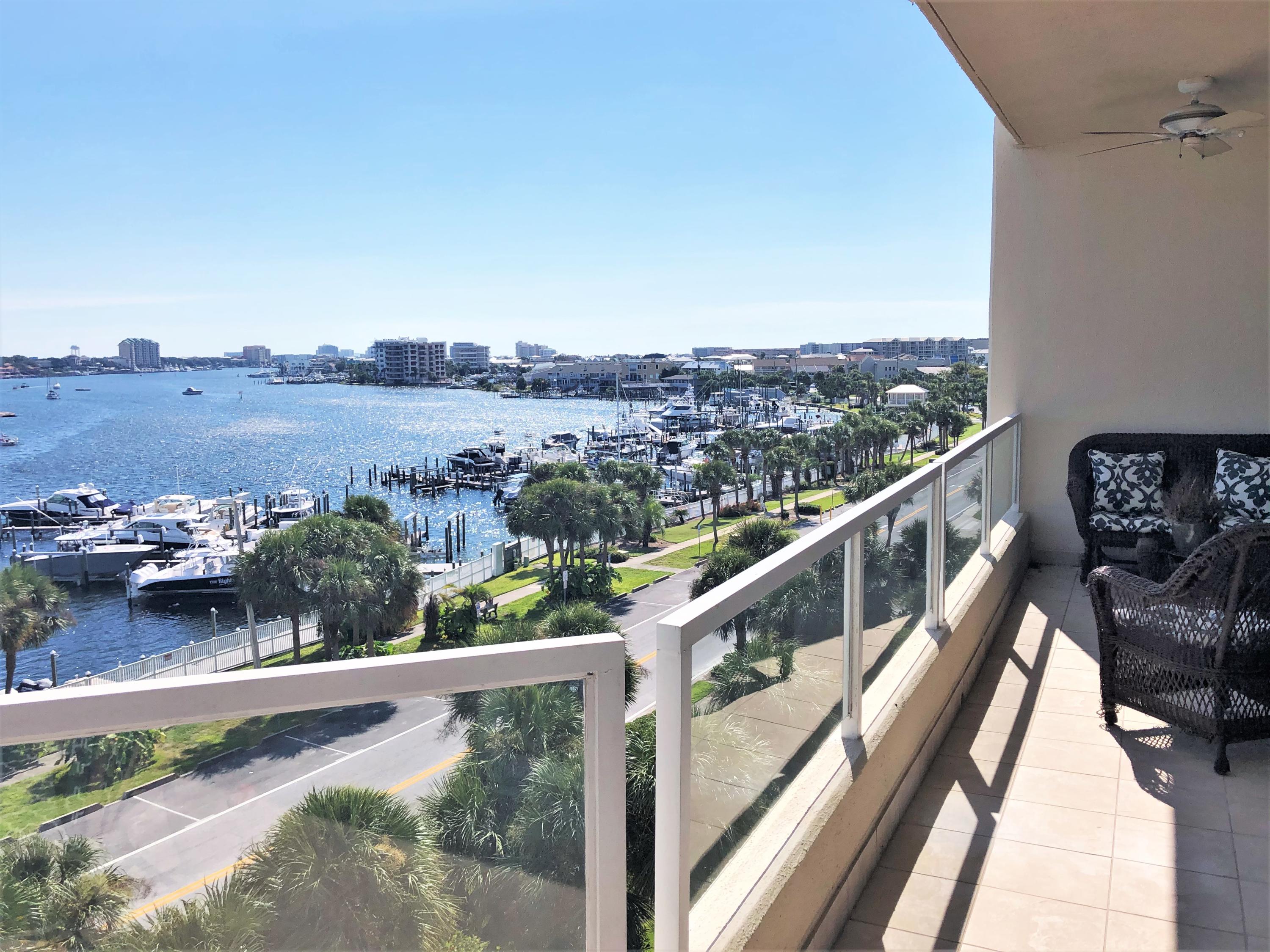 STUNNING, expansive harbor front views throughout this professionally decorated 3 bedroom, 3 bath condo are a must see! Exquisitely detailed, this gorgeous residence is offered fully furnished and features large balconies and spacious floor plan, which allows natural flow for entertaining and relaxing. Other features are travertine and bamboo flooring, granite counter tops, fireplace, and plantation shutters. Also included is a gated entrance, covered designated parking space with an extra storage space. The complex also offers a heated waterfront pool and spa, beach, fitness center,and owners lounge.