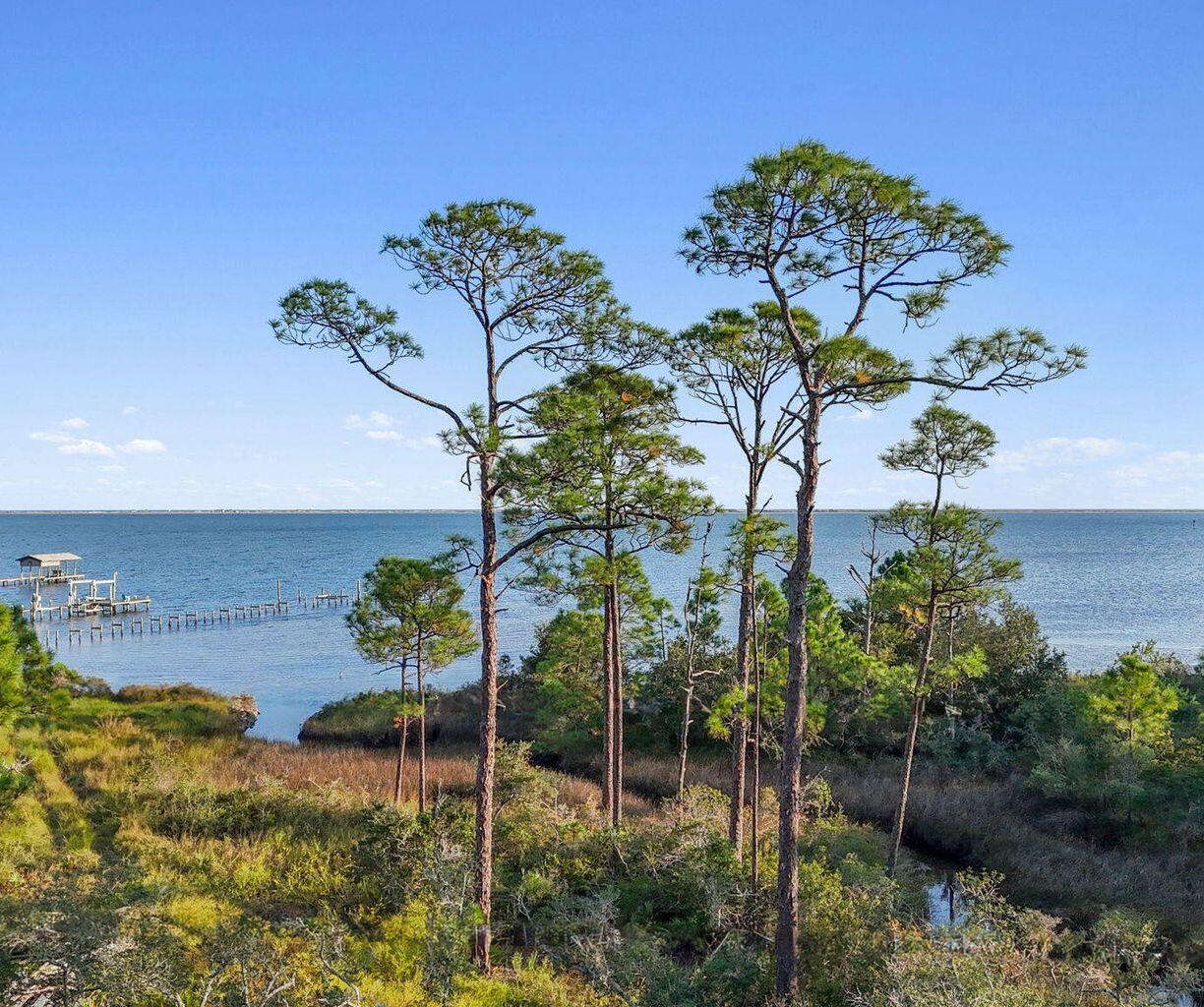 Ask about the Multi Lot Discount..Discover the perfect canvas for your future with this stunning piece of land, offering beautiful water views and unbeatable tranquility. Nestled in a picturesque setting, this prime .26-acre lot provides you with the unique opportunity to design and create the home of your dreams, all while being surrounded by nature's beauty. Enjoy mesmerizing sunrises and sunsets right from your future porch or deck. Less than two minutes from launching your boat in the Santa Rosa Sound and just minutes from the Beautiful Gulf of Mexico and Pensacola Beaches. https://media.bluewaterphotographyfl.com/videos/019254f3-d6ae-71e5-a52d-2c0ac848e6b6Multiple Lots Available