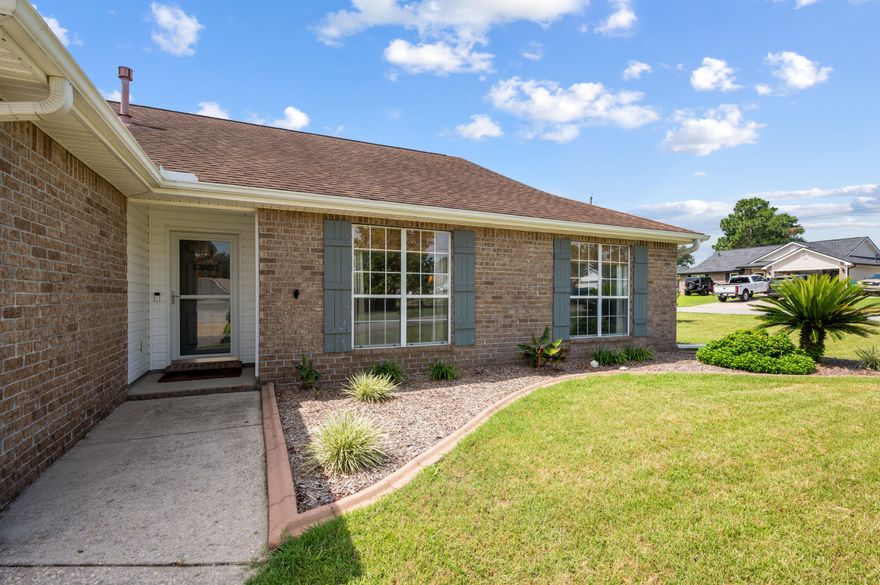 Your Perfect Oasis Awaits you. Welcome home to this Gorgeous 4 bedroom 2 bath home. Nestled in a quaint subdivision south of I-10, this all brick home has a welcoming vibe and neutral pallet waiting for you and your cozy lifestyle. As you enter the home the separate foyer complete with closet gives a glance into the great room. Move throughout the home with ease and into the dining area and custom kitchen. The kitchen has an amazing amount of cabinets, granite countertops and stainless steel appliances. From the kitchen and living room you have access to the large utility room and thus access to the 2 car oversized garage. All 4 bedrooms sit on the right side of the home. The master is large with an updated Ensuite with double vanity and spa like shower, separate tub and walk in closet. The oversized Florida room (screened in porch) you can entertain all times of the year, the newly installed pavers lead to the outdoor dining space, the lounging area, shed and pool. Sun sail installed for shade on those hot days. The new 10x20 outdoor shed is perfect for lawn care items, pool floats and gardening tools.  This home is perfect for all who want to sit their items down and live. Buyer to verify all measurements and home necessities. Components ages are waterheater 22', roof 14', Hvac 14', Shed 23'.