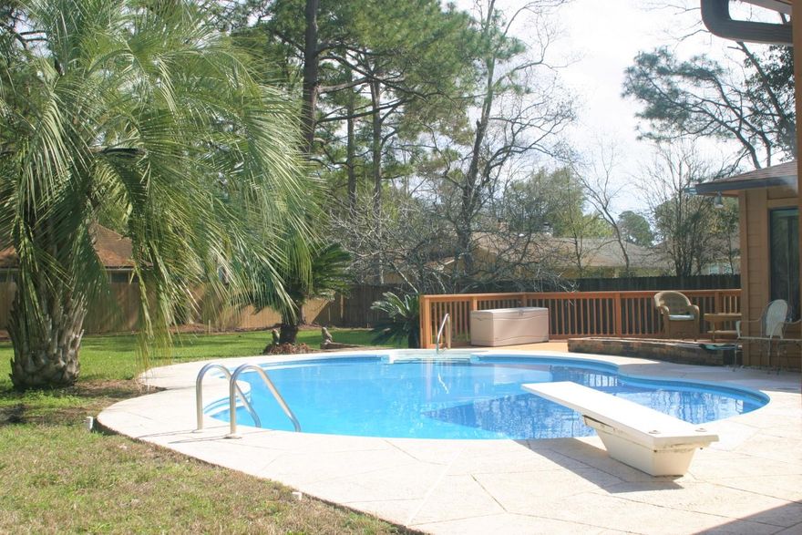 Welcome to a tastefully done ranch style single story home. As you enter, it opens into the family room where you will see the stone gas fireplace with hearth and window to the pool. The nook and kitchen are right ahead with granite counter tops and stainless steel appliances. There is a pass through that goes to the Florida room. The Florida room comes complete with a wraparound bar, padded rail and foot rest. This space is great for meeting and relaxing after a dip in the in ground pool. Next you will see the 3 bedrooms, 2 baths, which are spacious. Flooring consists of some hardwood, tile and wall to wall carpeting. The backyard is set up for entertaining with a large freshly painted wooden deck and plenty of Kool deck around the pool. Backyard is huge; plenty of space for