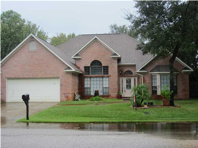 TAKING BACK UP OFFERS. PLEASE SHOW. BIG PRICE REDUCTION! Great price in wonderful neighborhood. Imaculate home in Destin! Walk into an ''open'' concept with tall ceilings. Front door and side lights have been upgraded. Spacious living/family room with fireplace. (Owner upgraded to ventless gas logs) The owner remodeled the kitchen with granite countertops, refaced cherry cabinets, stainless steele appliances and new fixtures. The breakfast nook overlooks the beautiful landscaped fenced yard with a door leading to the the paver brick patio. The owner added the half bath with travertine floors, pedestal sink and a door opening to the back yard. Also, there is a sealed doggie door that could easily be added back without much trouble. Split plan allows privacy for family or