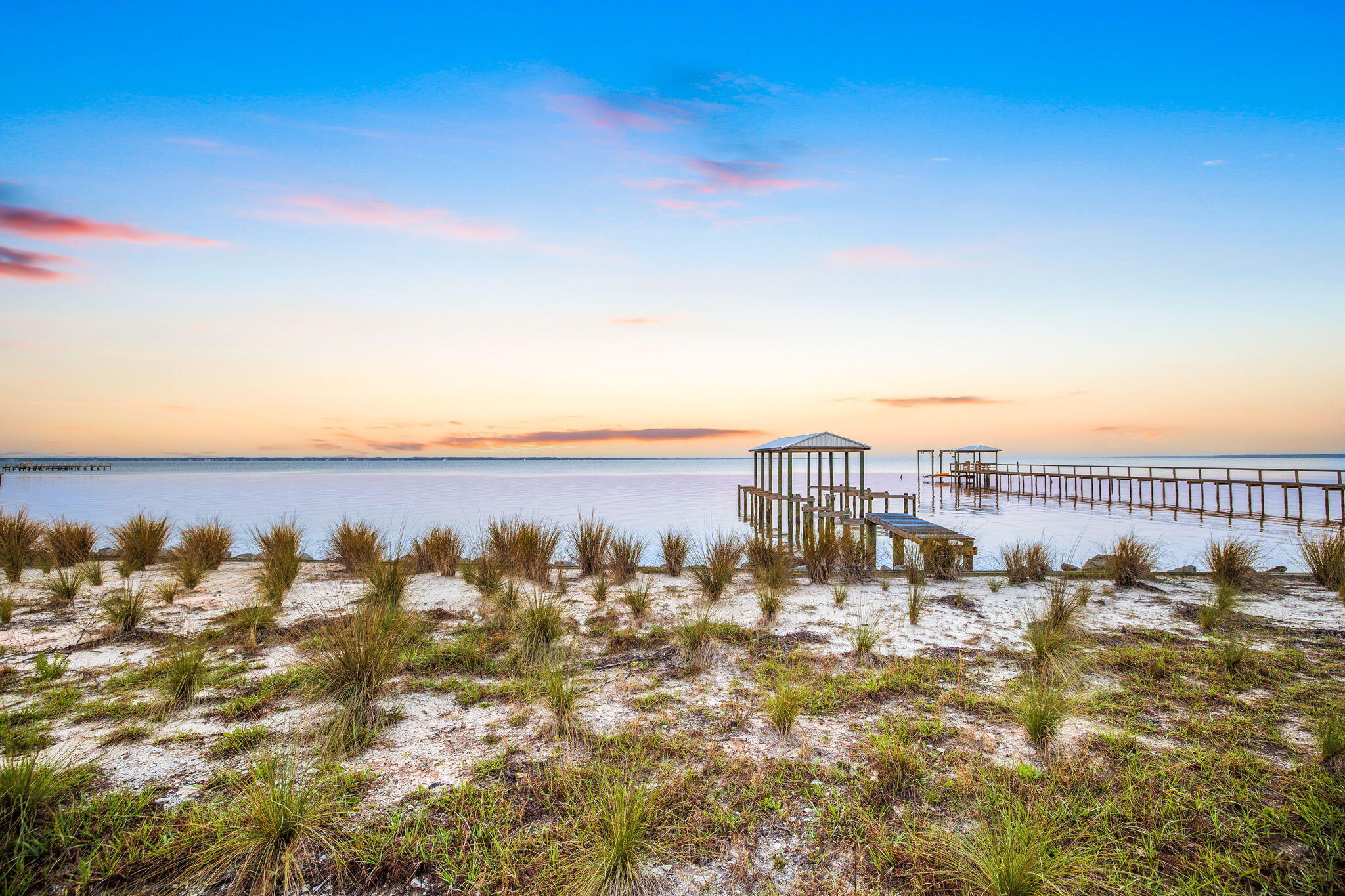 Beautiful BAYFRONT Lot with Sunset Views in growing Freeport! Large .42 acre with 80 feet of water frontage on the beautiful Choctawhatchee Bay. Seawall and pilings for boat house and dock are in place. Low HOA fee! No build out time, lot is ready to build on with partial water/sewer taps paid! New seawall and riprap installed 2020. Set in a beautifully landscaped neighborhood of BAY HARBOUR, Freeport, this community has tennis court, community dock, boat/RV storage and nature trails throughout. Seller Financing available for qualified buyer.$575,000 for Lot 44.https://array-listing-content.aryeo.com/videos/ed30a88a-0584-4e1f-b623-99e0776b50f0 https://array-listing-content.aryeo.com/videos/ed30a88a-0584-4e1f-b623-99e0776b50f0