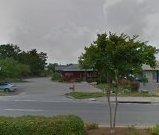 100 front ft on Main St. with abundant parking. Building is 2580 sf.