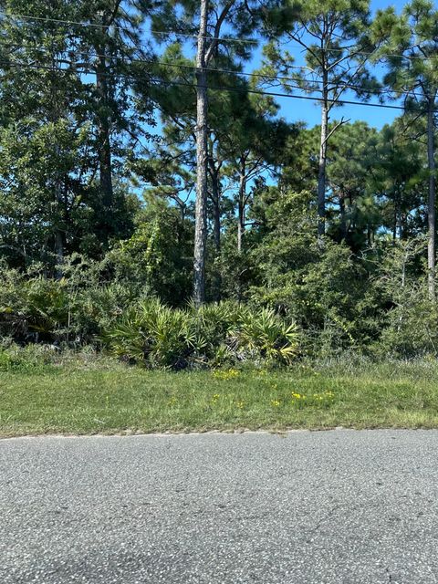 Photo of 8140 Frontera Street, Navarre, FL 32566 (MLS # 988326)