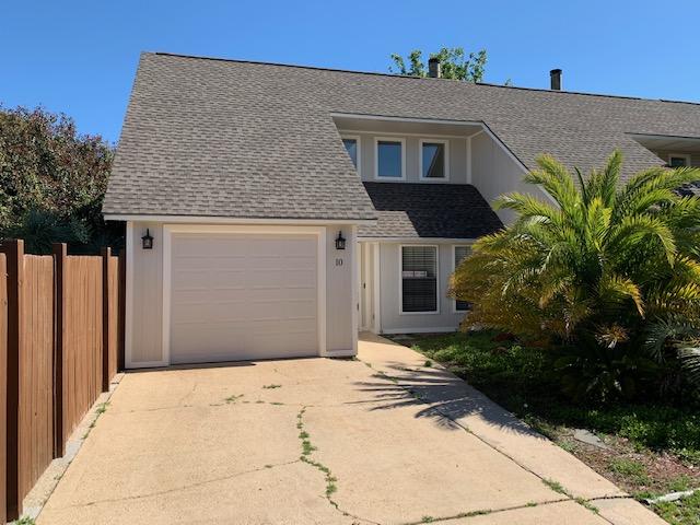 This beautifully updated end unit town home has tile/wood flooring downstairs with carpet upstairs. Master bath has granite tub with separate tile shower, updated vanities and lights; garage has been converted to the third bedroom. There is a storage building out back for tenants use. There is a double gate for extra boat/trailer/RV parking. Pets are not negotiable. Available 5-5-20.