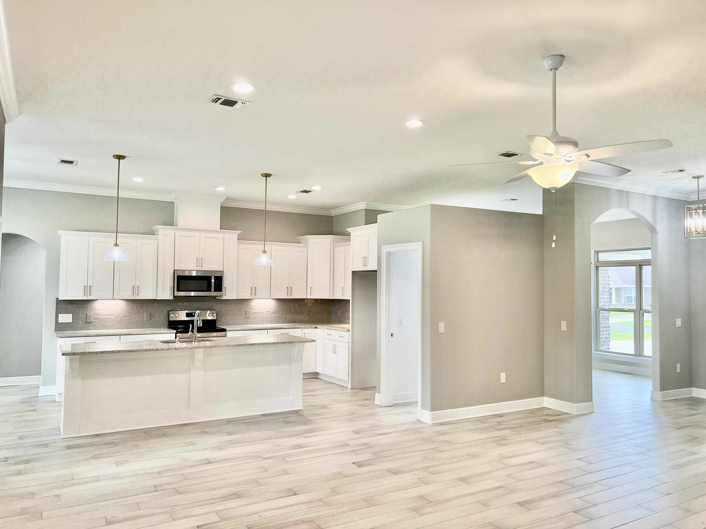 NEW CRAFTSMAN Custom Built Home in Holley By The Sea,Enjoying all the Club House amenities including :Pools,Fully Equipped Gym,Tennis Courts,Waterfront Park & Deeded Access to Santa Rosa Sound This luxurious 4 bed/3 bath Tri split floor plan is under construction...and will be ready in time for your summer move in  ~Great Location within HBTS..with easy access to Navarre Beach, shopping and Hwy 98 to Hurlburt Field AFB.This Stunning Robbins Builders Custom Home offers trend setting design & features~Greeted by a walk in foyer open to the Formal Dining and Office through to your open floor plan ~Large Gourmet kitchen enjoying shaker cabinets with crown molding ~ beautiful granite counter tops~Tiled Back splash~Under Mount Sink~S/S