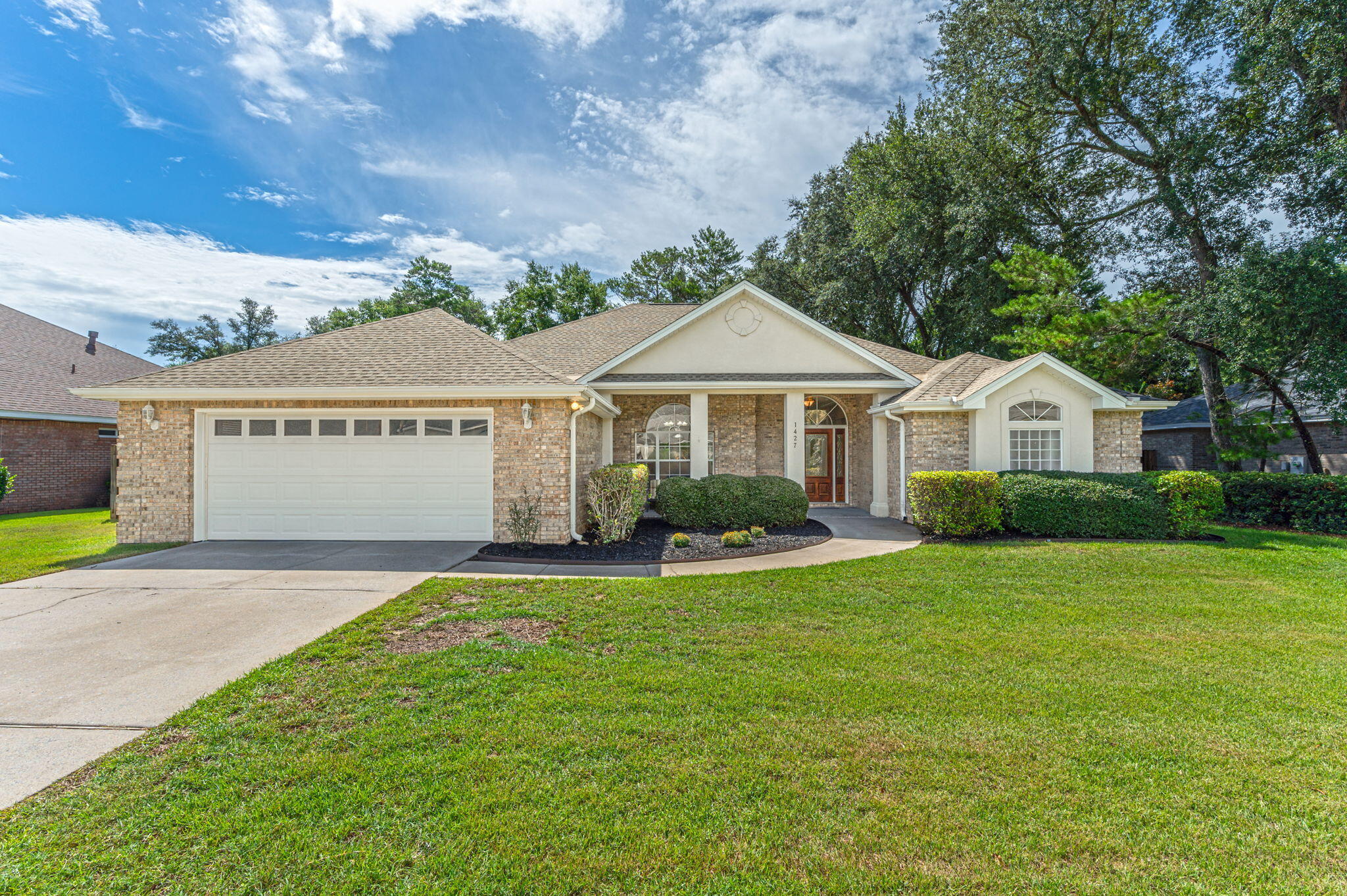 This exceptional home, located in the highly sought-after Bluewater Elementary district and situated on a quiet cul-de-sac street within gated Magnolia Plantation. Recent improvements include a new roof, new paint and carpet, new quartz countertops and backsplash, and new tile in the primary shower. The home features a spacious living room and dining room, providing ample space for entertaining and hosting gatherings. The kitchen offers plenty of cabinet space, a breakfast bar with a view of the keeping room which features a cozy gas fireplace, creating a warm and inviting atmosphere for family and guests. The primary suite, features a walk-in shower, double vanity a jetted tub, and two walk-in closets. In addition to the primary suite, there are three additional bedrooms and two full baths, ensuring plenty of space for guests. The seller has enhanced the home by enclosing the screened-in porch, equipping it with air conditioning and dual ceiling fans for year round use. This versatile space can be transformed into an office, playroom, or home gym, catering to a variety of needs. The private, fenced, and level backyard offers a perfect outdoor space for activities and relaxation. Don't miss the opportunity to own this incredible home in Magnolia Plantation! With its convenient location near Eglin AFB and the beautiful beaches of Destin, this property provides both convenience and the opportunity to enjoy the best Niceville has to offer!