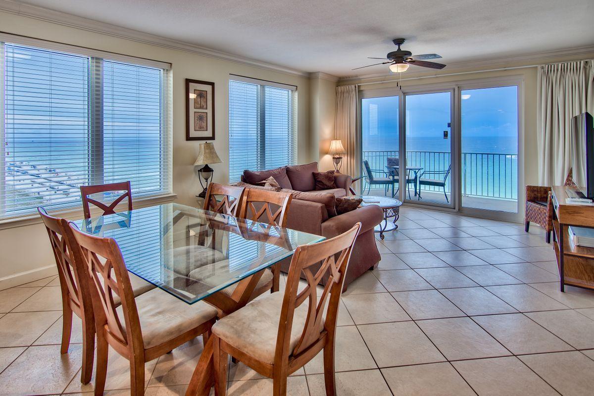 Motivated! Seller will consider all offers. You have to see this spacious fully furnished Gulf front 7th floor corner unit with stunning views right away! As you enter you will see why it's named Grandview East! Pamper yourself with the luxury and elegance you deserve in this low density development that gives you an intimate setting on the sugary white sands of Panama City Beach. Featuring an open floor plan, roomy kitchen with beautiful granite counter-tops, stainless steel appliances, hard surface tile flooring throughout, crown molding in living area and a large laundry room with owners closet. Enjoy an over-sized Gulf front facing master suite overlooking the water that opens to the balcony with walk-in closet . The attached en'suite features double vanities, Jacuzzi tub, and separate