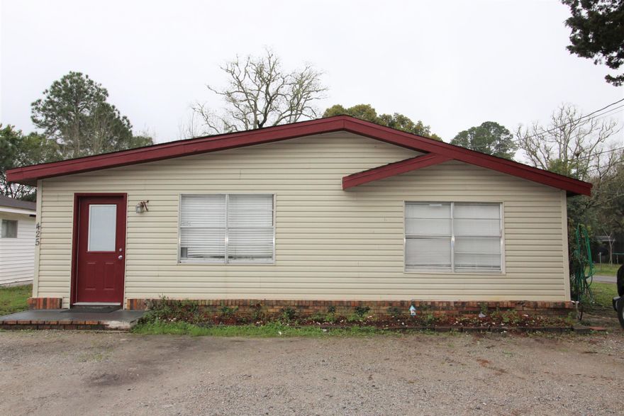 Investors only! This 3 bedrooms 2 baths house offers open floor plan, wooden floor, inside laundry room and nice size living room and kitchen area.Nicely updated inside.The roof needs TLC and possible to get renovation loan.Property can be use as commercial property. Sold 'AS IS' condition. Current tenant want to have a long term lease. Buyer to verify room dimensions and SF of the building.