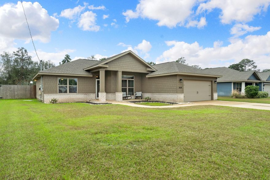 Multiple offers. Highest best by Sunday 5 pm. CRAFTSMAN Custom Built Home in EAST NAVARRE! This luxurious 4 bed/2 bath floor plan ~.This Stunning Robbins Builders Custom Home offers trend setting Features~Greeted by a walk in foyer sweeping through to your open floor plan~Large kitchen enjoying custom staggered cabinets with crown molding, beautiful GRANITE counter tops~Under mount sink~S/S appliances ~Center Island with Hop Up Breakfast bar & open flow to the dining area and large family room, Wood laminate through the foyer & main living area with tiled laundry and bathrooms.Large Master with trey ceiling & ceiling fan~Master bath offers an oversized TILED shower  ~Cultured Marble