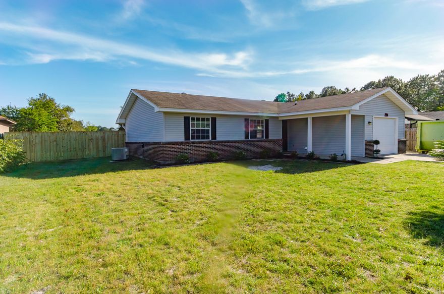 SELLER WILL PAY CLOSING COST!! FULLY RENOVATED NEARLY 2000 SQFT HOME IN QUIET COMMUNITY NEAR HURLBURT AFB AND BEACHES!! This 3 bedroom 2 bath 1 car garage home offers a fully equipped designer kitchen with granite counter tops, designer cabinetry, extra large island, stainless steel appliances all in a nearly 300 sqft room! Home Features include, wood laminate floors throughout, newer windows, newer HVAC, french door openings to two exterior patios, fresh paint, new fixtures & much more! Speaking of character, you will love the brick accented living room with vaulted ceilings. The most extravagant feature of this home is the massive 600 sqft Room that can be used as a impressive man cave, vast media or entertainment room and/or a striking family room! Master Suite includes walk in close and french door opening to private patio in fully privacy fenced back yard. You will love the serenity of this semi-rural location, large lot..nearly .25 acre! Great space for RV or Boat Parking. Double gate entry to fully fenced in back yard, including a separate gravel driveway. Call to see today! 