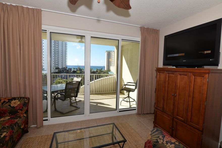 DIRECT VIEW OF THE GULF from this ''MIDDLE OF THE BUILDING'', SUPER NICE one bedroom condo with HALL BUNKS! Enjoy the calm, cool breeze from the gulf on your spacious balcony. There are two vanities to provide accommodations for the bedroom guests & the other four guests to include bunk & a sleeper sofa. The kitchen features granite counter tops & pretty cabinets. There are tile floors in the main common areas & a stackable washer & dryer too. The owners have taken good care of the property keeping it in condition & updated. Enjoy views of the coastline that go on for miles & miles. Only a short walk to the deeded beach & beautiful gulf waters, Ariel Dunes is a signature complex with two towers located in the gated community of Seascape Resort. Amenities include 2000 feet of deeded