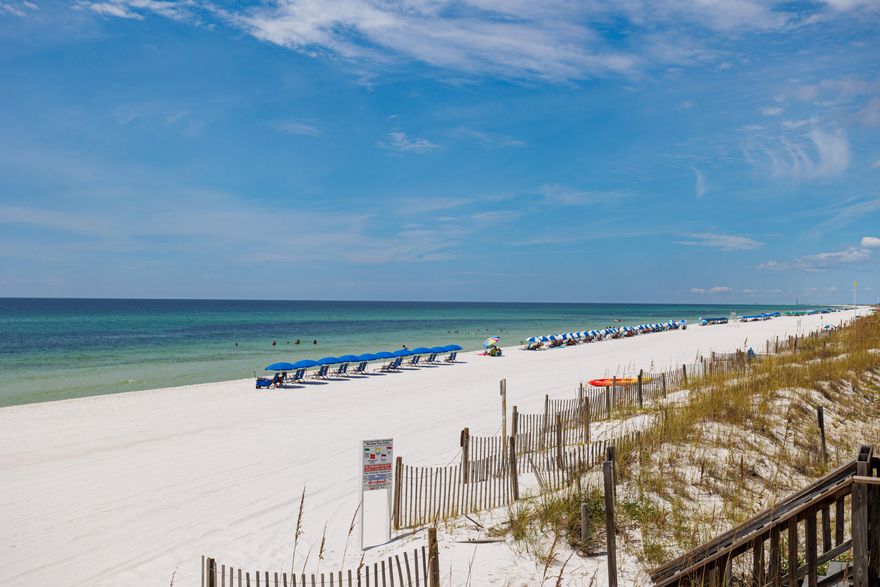This Beautiful Condo with Ocean Views on Okaloosa Island is the perfect location steps from the Gulf with a balcony for relaxing and enjoying beach life. Just out the door, the beach access can be seen directly ahead. Lay on the beach all day, then take a stroll in the moonlight. Prefer to swim in some fresh water? The community pool is ready for you with tables and chairs for sitting and chatting between swims. Ready for fine dining and nightlife? Fort Walton Beach and Destin are both close by with many amazing dining and entertainment options. Want to cook out?  There is a patio for enjoying the afternoon sea breeze or a BBQ cooking out.