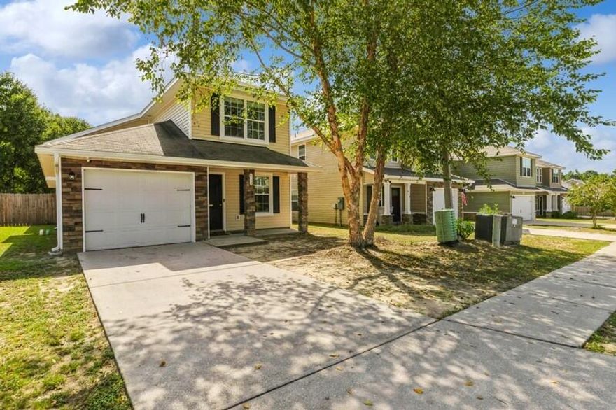 Up to $6000 in buyer concessions. Welcome to this remarkable residence that boasts 4 bedrooms and 2.5 baths, offering an abundance of space for comfortable living. The main floor greets you with a captivating wide open floor plan, creating a seamless flow throughout and new carpet. Prepare to be enchanted by the tastefully upgraded wood-look tile that graces the main living areas and kitchen, adding an exquisite touch of elegance.The well-appointed kitchen is a true culinary haven, showcasing sleek stainless-steel appliances, a generously sized breakfast bar, and an impressive amount of countertop space. It's the perfect spot to unleash your culinary creativity while hosting gatherings and creating lasting memories.