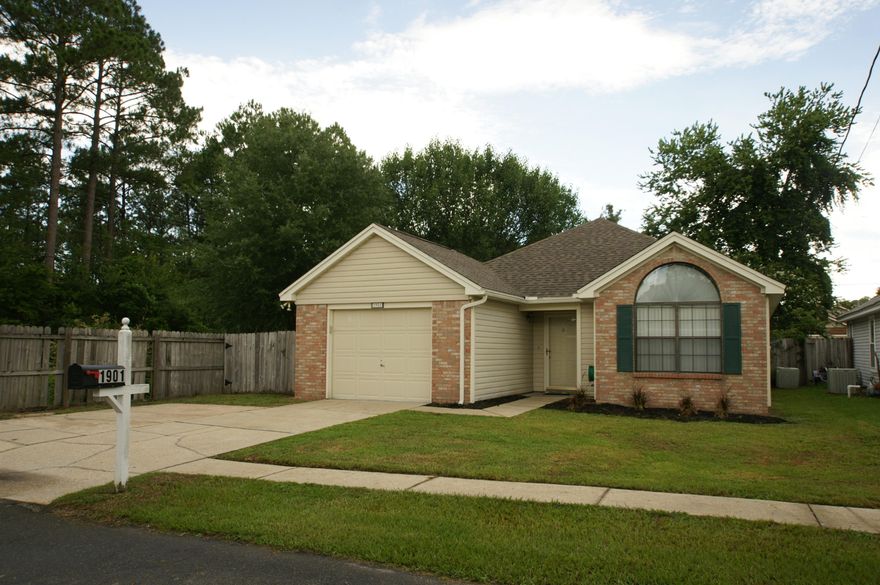 Charming home centrally located in the heart of Fort Walton Beach. New dimensional shingle roof. This home is move in ready. Light and bright. Open floor plan. Split bedroom. Lovely shaded back yard with room for small garden. Wood burning fireplace. Large gate on the left side of the house will accommodate boat parking. Vaulted ceilings. Close to both military bases, shopping, and beaches. Home is priced to sell and won't last long. Come see your new home today!