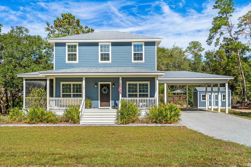 Introducing: 121 Carlos Court. A custom 2310 sf home featuring 3 BD/BR, bonus room, office and surplus of storage space. This wonderfully appointed home is nestled on over a half an acre close to Eden Garden State Park in Point Washington- offering a peaceful escape all within minutes of the white sandy beaches, fresh seafood restaurants, and shopping on 30a.  A charming front porch invites you into a spacious and open floor plan featuring plenty of windows, an abundance of natural light as well as views of the beautiful wooded surroundings.  The spacious kitchen with quartz countertops and stainless steel appliances leads to a screened in outdoor porch where you can enjoy the peace and quiet of this serene and private setting.  The backyard provides an underground pool, a beautiful