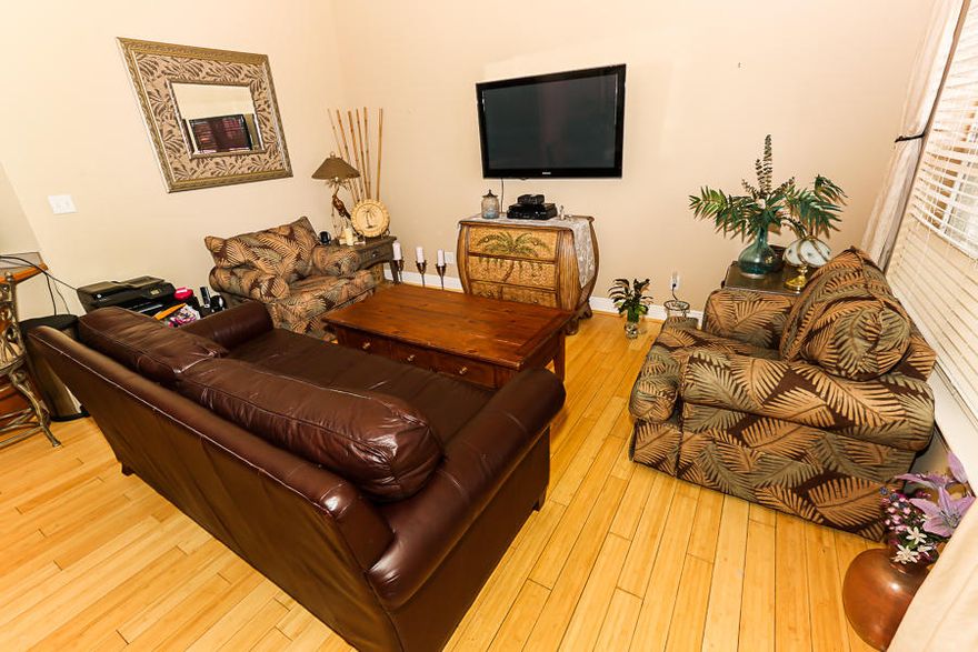 BRING OFFER!! SELLER MOTIVATED!! OWNER WILL CONSIDER LEASE WITH OPTION!! Beautifully updated, fully furnished 2 story condo only 5 blocks to the beach. Centrally located near shopping, golf and award winning restaurants! This unit would be a great PRIMARY RESIDENCE or a lucrative INVESTMENT PROPERTY boasting a 6.25% ROI!! Eliminate your commute altogether and open your business in one of the commercial spaces downstairs! This spacious condo has a 1st floor master suite with bamboo floors a jacuzzi bath, separate shower, dual vanities, and walk in closet. Condo has bamboo flooring in the living/dining area with tile throughout the kitchen and baths. An elegant spiral staircase leads to the loft bedroom that has its own full bath and walk in closet. A great condo, priced right, MAKE AN OFFER