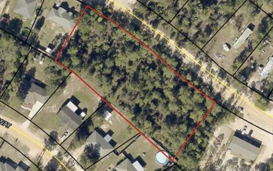 Large lot that could be subdivided into 4 lots. Providing an easy access to HWY 90 and to shopping, bases, and beaches. Bring your home plans today!