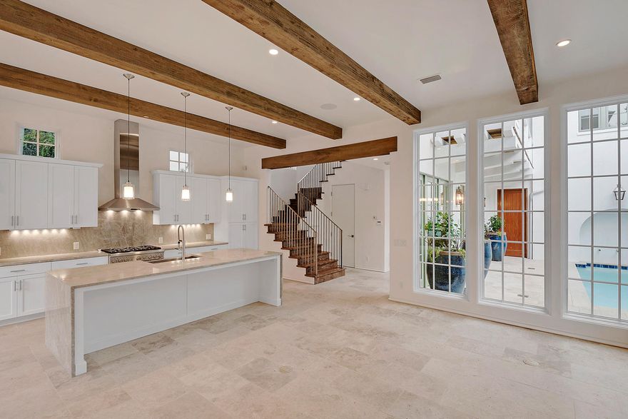On the desirable east end of Scenic Highway 30A, in the mature and almost entirely built out new urbanism community of Rosemary Beach, new construction as found in this park side home rarely comes available. Built of concrete block near Cabana Pool, the main house and carriage house of The Cabana II envelope a private courtyard with pool and built-in grill. Each bedroom offers an en suite as well as a large closet, making it well suited for extended stays or full-time residency. Over the two-car garage is a spacious carriage house. A cathedral ceiling accentuates the spaciousness of its open living areas that include a full kitchen. Though connected with the main home by the second floor courtyard balcony, the carriage house features a private entry, making it ideal for hosting guests.