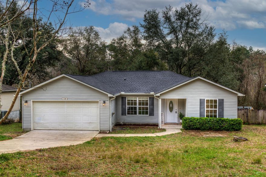 This Beautiful updated home is ready to welcome its brand new owners! From it's split floor plan. The kitchen shines with all new appliances and countertops. The living room provides ample space for multiple family activities going on. There is new LVP flooring and fresh paint thought. The garage is packed with storage options and attic space has plywood down to store all your seasonal items. The back yard is completely fences with a screen room that overlooks the  mature wood area in the back of the propertie.2021 major updates roof,ac,water heater, counter top, flooring, paint, appliances.Excepting back up offers