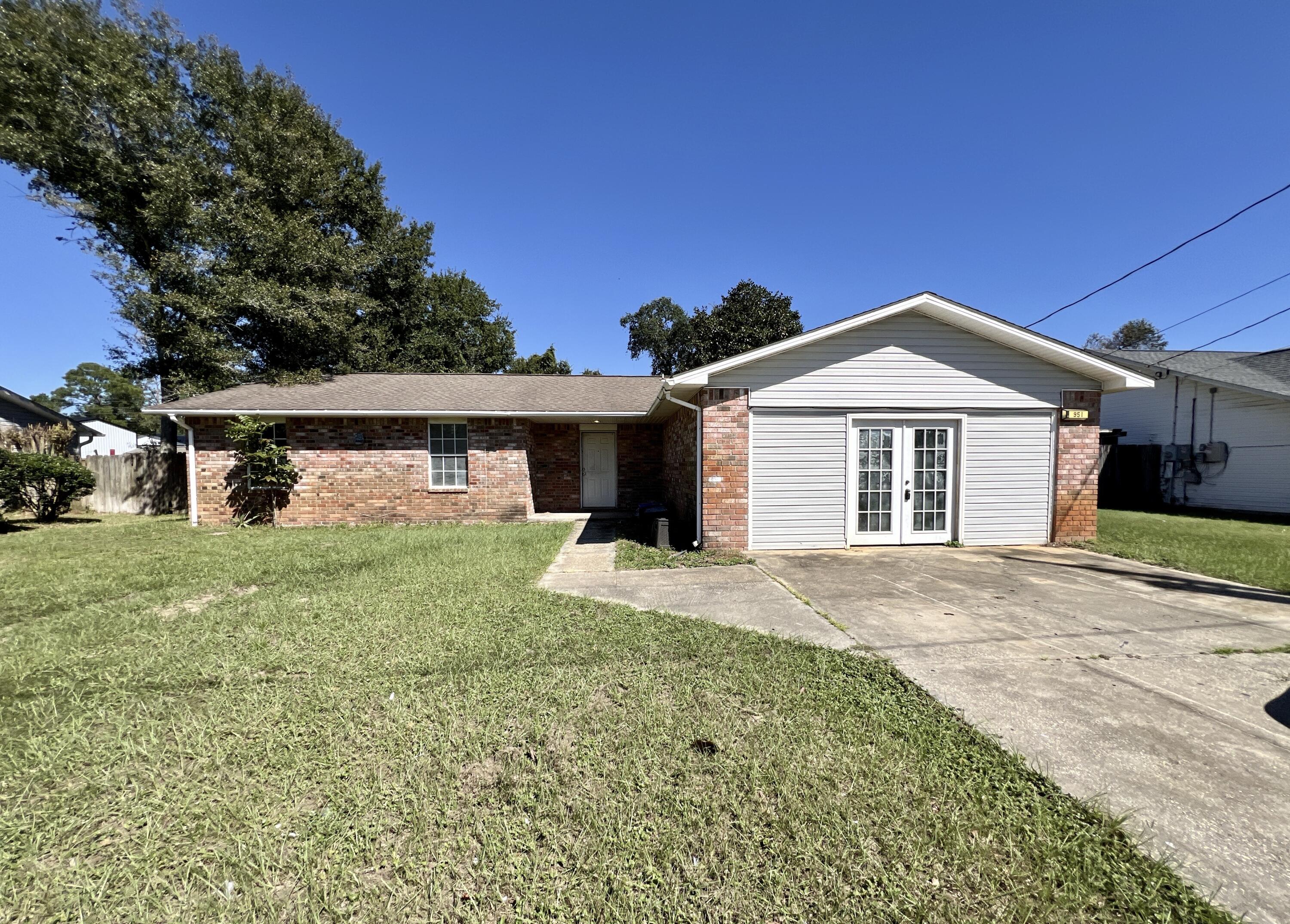 A Diamond in the Rough: This 1995 REO property is a gem, nestled on a quarter-acre lot, offers endless potential. With 3 bedrooms and 2 baths, it's a blank canvas ready for your personal touch. The original 2-car garage has been transformed into additional living space. HomeFeatures charming brick front and vinyl siding, the exterior promises durability and curb appeal. Inside, you'll find mostly tile flooring. Note: This property requires cash or rehab financing. The seller has never occupied the property and thus has no prior history, surveys etc.  Don't miss your chance to own this hidden treasure!