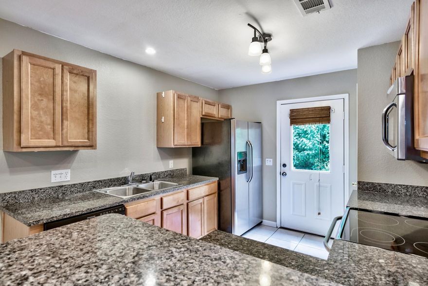 Updated townhome centrally located on a small lake in the heart of Destin! Features include granite counters, stainless steel appliances, tile and laminate flooring throughout, cathedral ceiling, upgraded lighting, lots of storage, and more. The upstairs offers a large private master suite. Quail Lake Townhomes is perfectly situated in central Destin and is just minutes to the beach and all of the fun and great food that Destin is known for. It also features a community pool just steps from this unit. Come take a look! Buyer to please verify all information contained herein.