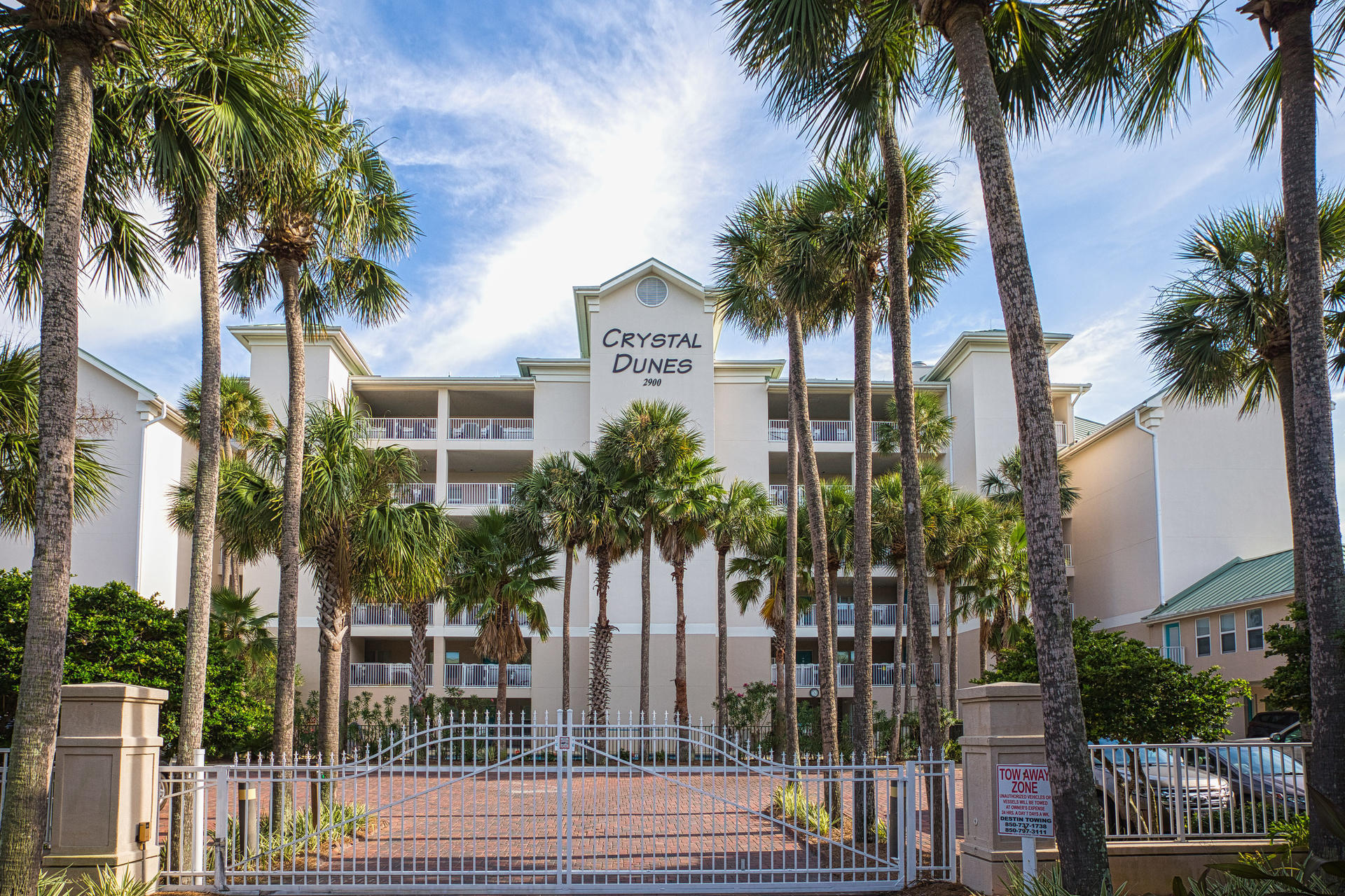 Fantastic views from every room in this gulf front townhouse/penthouse unit in the middle of Crystal Beach! This condo has masters upstairs and downstairs with three balconies.It is convenient to great restaurants and shopping. Updated 'coastal beachy' including granite & quartz; frame-less showers in both masters, decorative marble tile on walls master bath, white kitchen cabinets, light fixtures, furniture, all new wall and window decor and balcony furniture plus all other decor items and bedding. Conservative rental projections are over $125k. The HOA dues are a low-low $800/month! Seller is offering a $10,000 flooring allowance. We updated it to "coastal beachy" including granite & quartz; frameless showers in both masters, decorative marble tile on walls master bath, white kitchen cabinets, light fixtures, furniture, all New wall and window decor and balcony furniture plus all other decor items and bedding